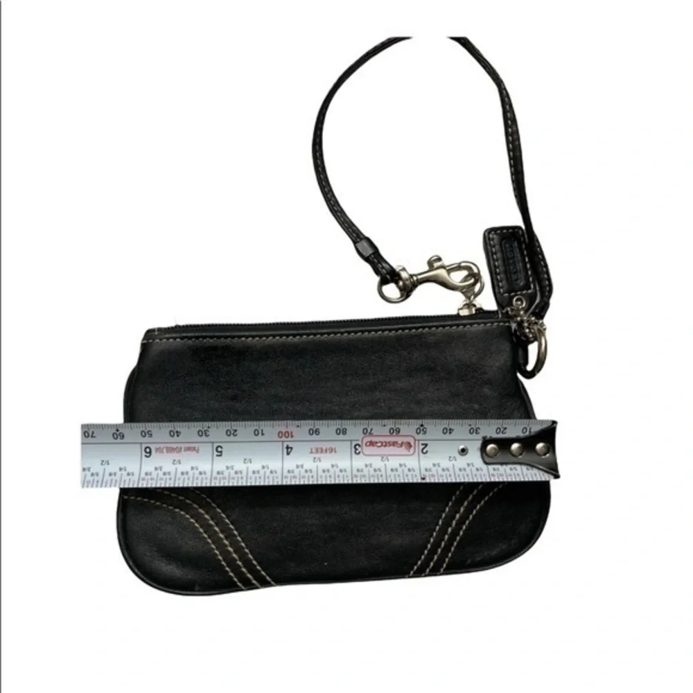 Coach black leather wristlet bag